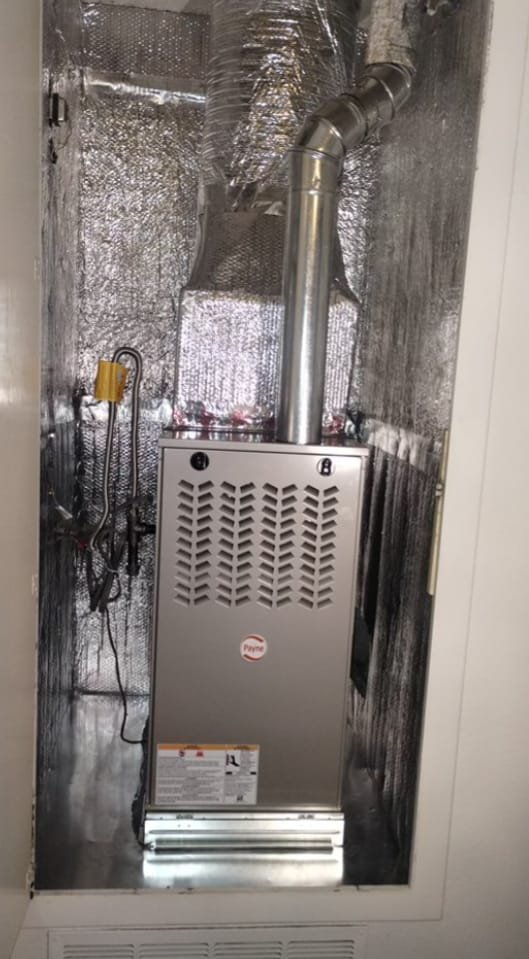 Residential Payne furnace in closet